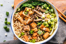 Bowl of vegan miso ramen with tofu and mushrooms